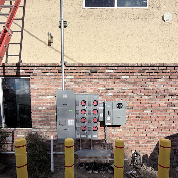 Completed apartment complex meter bank and commercial electrical panel upgrade installed by WCI Electric